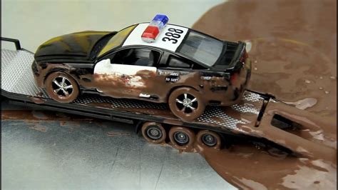 mud cleaner for car|police car stuck in mud.